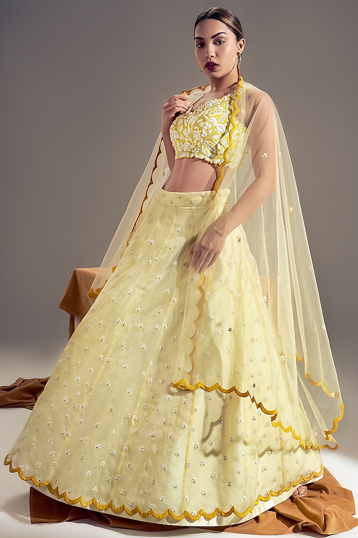 Pastel Yellow Embroidered Lehenga Set by Shloka Sudhakar