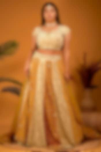 Mustard & Cream Suede Embroidered Wedding Lehenga Set by Shloka Sudhakar at Pernia's Pop Up Shop