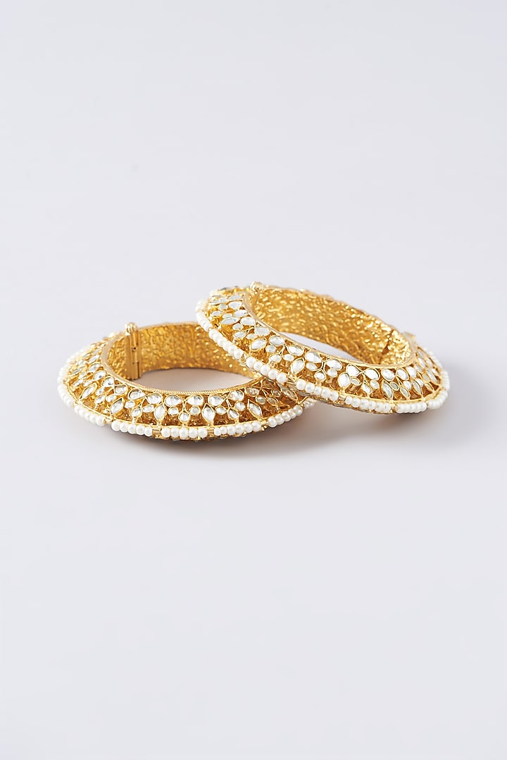Gold Plated Kundan Polki & Pearl Bangles (Set of 2) by Shlok Jewels at Pernia's Pop Up Shop