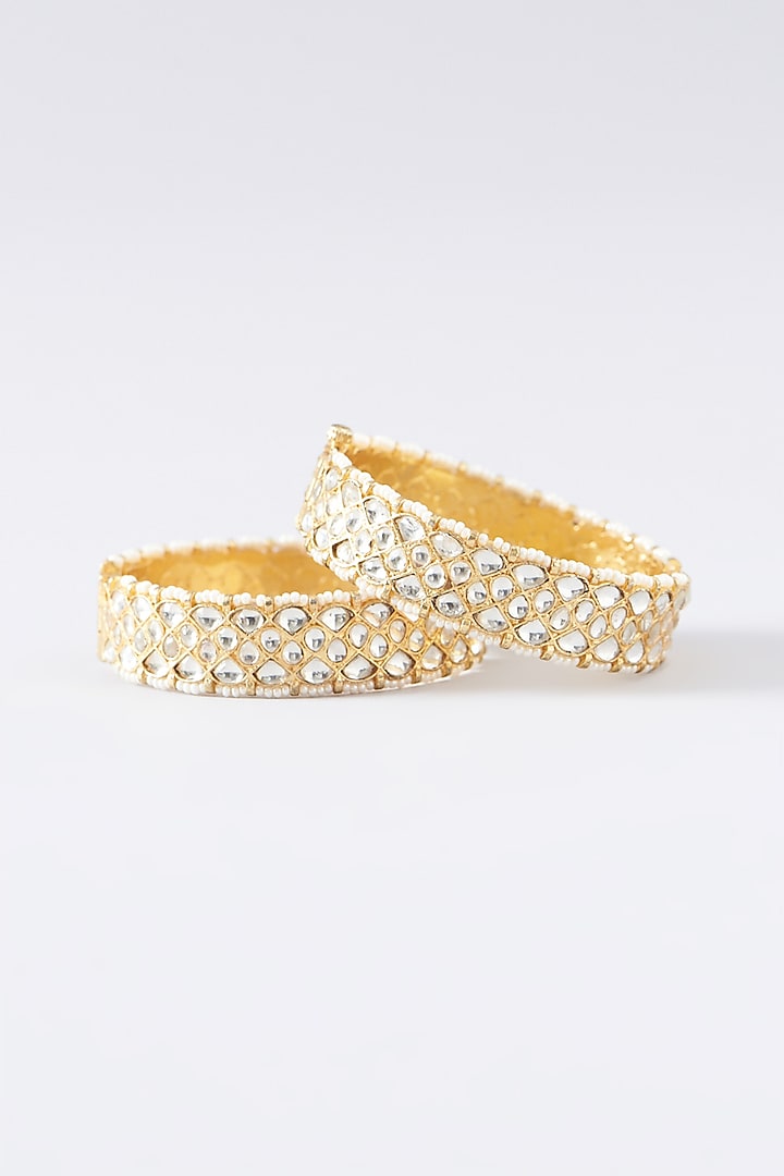 Gold Plated Kundan Polki & Pearl Bangles (Set of 2) by Shlok Jewels at Pernia's Pop Up Shop