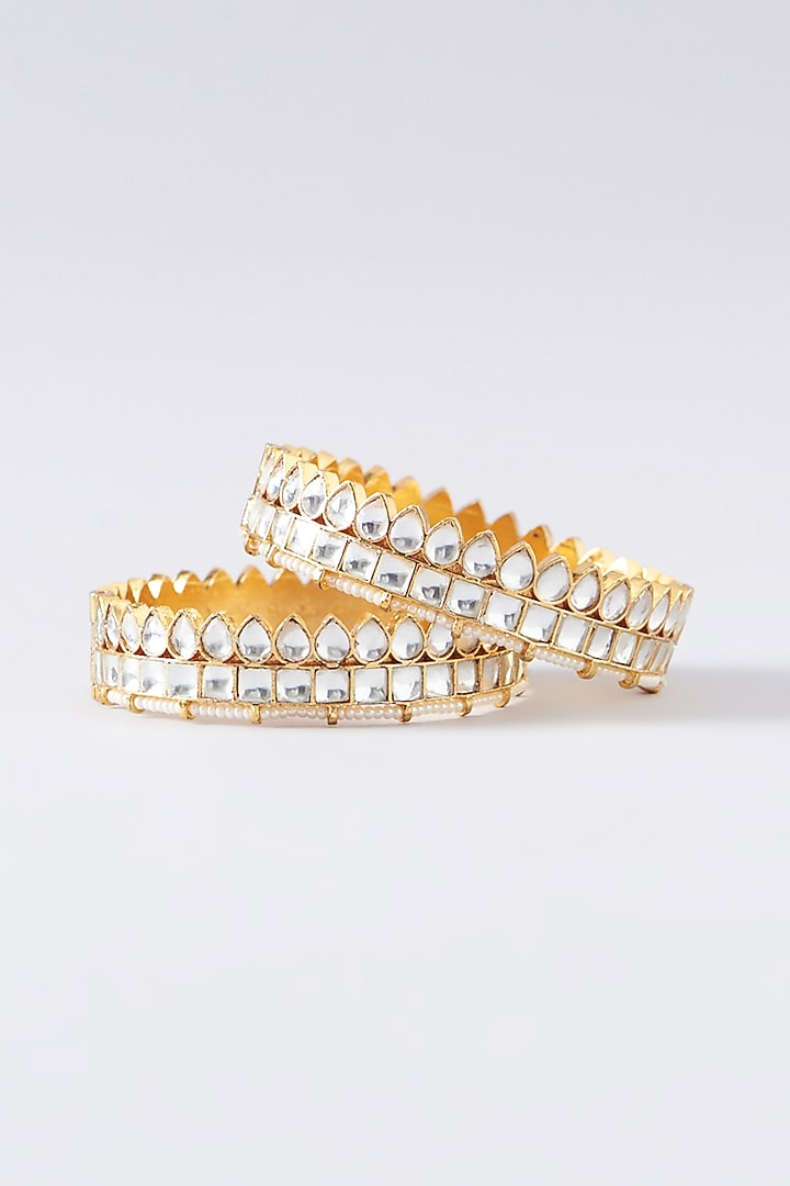 Gold Plated Kundan Polki & Pearl Bangles (Set of 2) by Shlok Jewels at Pernia's Pop Up Shop