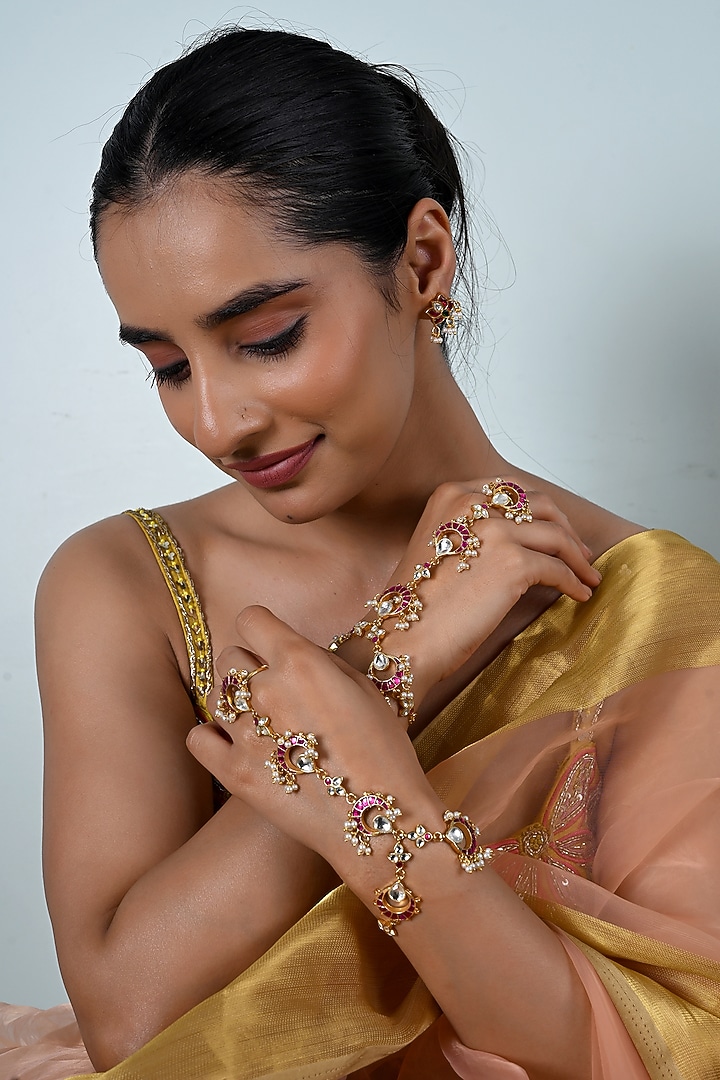 Gold Plated Jadau Multi-Colored Kundan Polki Haathphool (Set Of 2) by Shlok Jewels at Pernia's Pop Up Shop