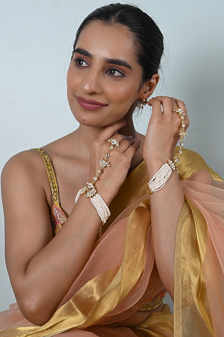 Gold Plated Jadau Kundan Polki Haathphool (Set Of 2) by Shlok Jewels at Pernia's Pop Up Shop