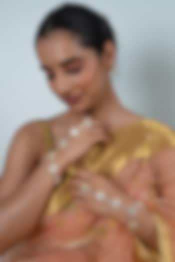 Gold Plated Jadau Kundan Polki & Mother Of Pearl Haathphool (Set Of 2) by Shlok Jewels at Pernia's Pop Up Shop