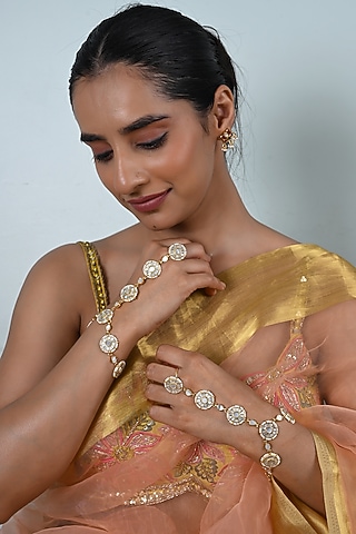 Gold Plated Jadau Kundan Polki & Mother Of Pearl Haathphool (Set Of 2) by Shlok Jewels