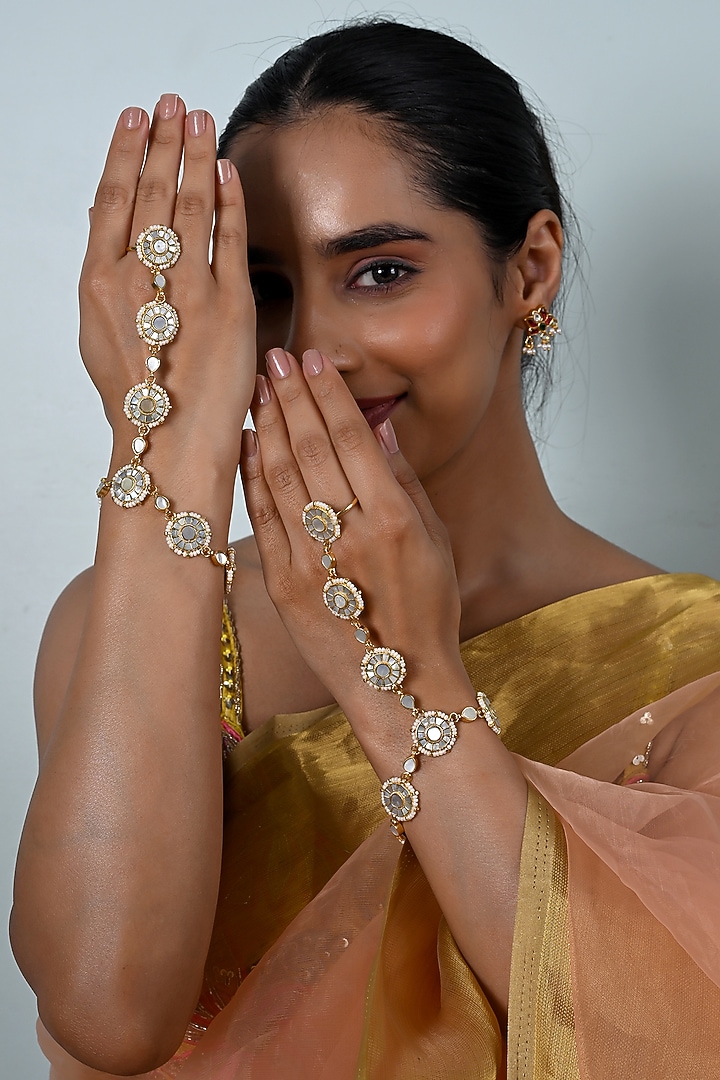 Gold Plated Jadau Kundan Polki & Mother Of Pearl Haathphool (Set Of 2) by Shlok Jewels at Pernia's Pop Up Shop