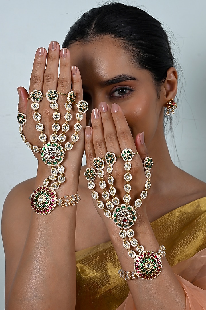 Gold Plated Jadau Multi-Colored Kundan Polki Haathphool (Set Of 2) by Shlok Jewels at Pernia's Pop Up Shop