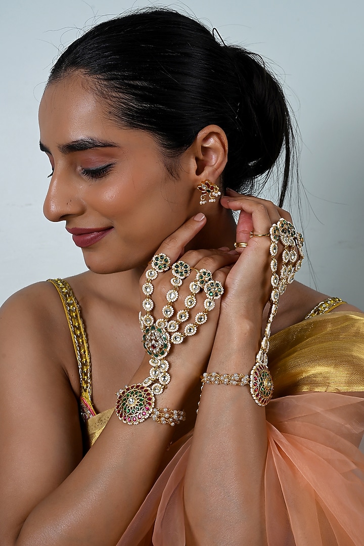 Gold Plated Jadau Multi-Colored Kundan Polki Haathphool (Set Of 2) by Shlok Jewels at Pernia's Pop Up Shop