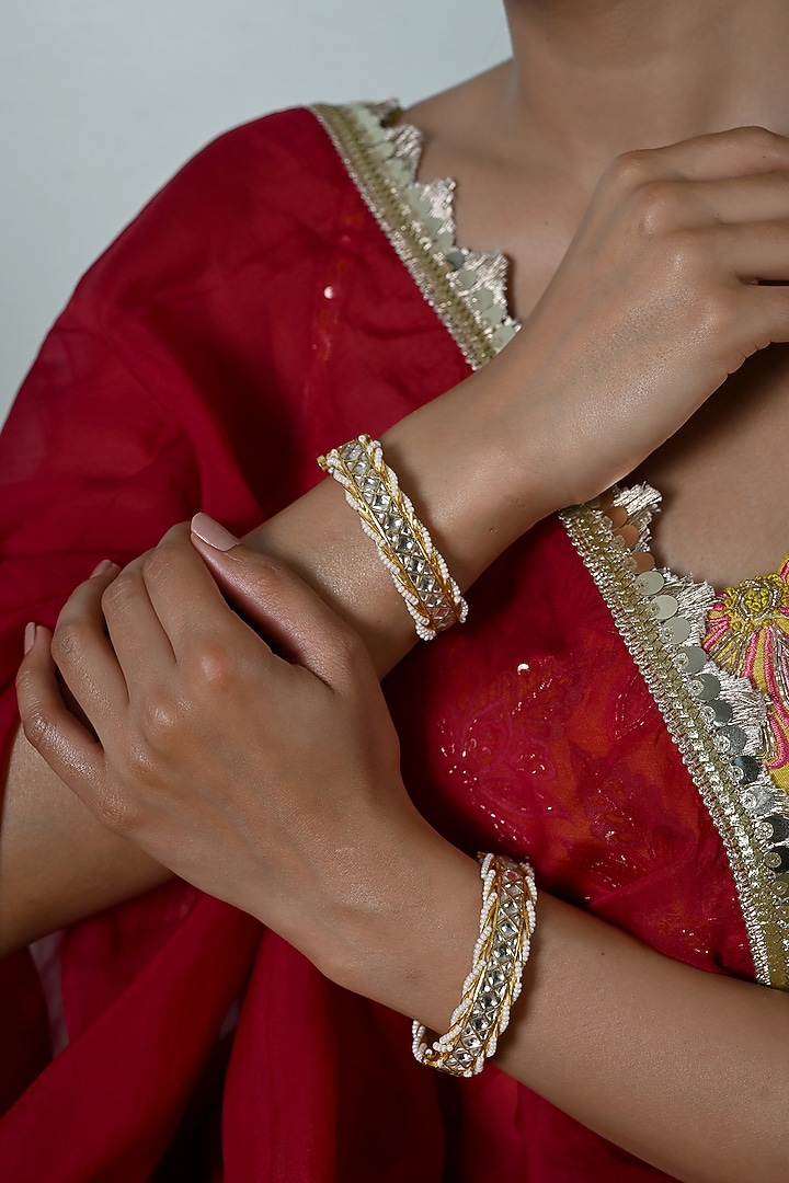 Gold Plated White Jadau Kundan Polki Bangles (Set Of 2) by Shlok Jewels at Pernia's Pop Up Shop