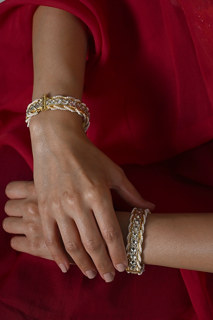 Gold Plated White Jadau Kundan Polki Bangles (Set Of 2) by Shlok Jewels at Pernia's Pop Up Shop
