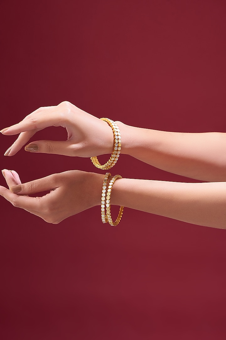 Gold Plated Kundan & Mother Of Pearls Bangles (Set of 2) by Shlok Jewels at Pernia's Pop Up Shop