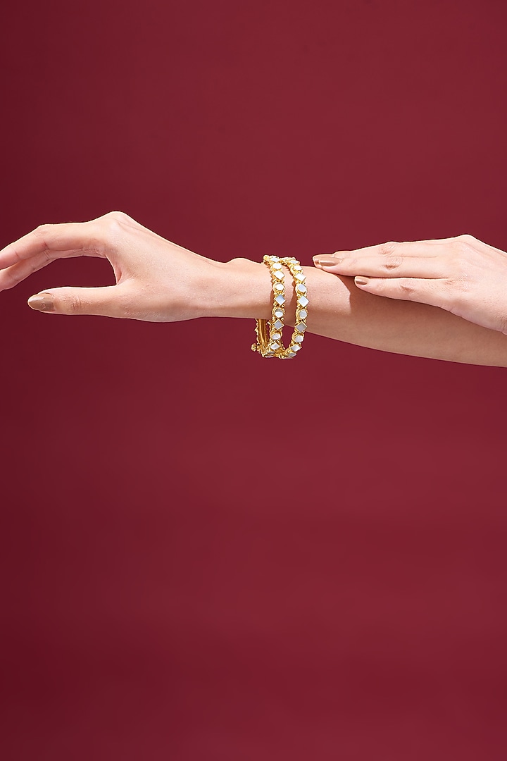 Gold Plated Kundan & Mother Of Pearls Bangles (Set of 2) by Shlok Jewels at Pernia's Pop Up Shop