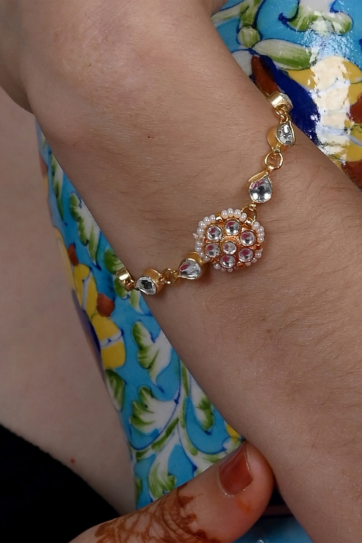 Gold Plated Jadau Kundan Polki Bracelet by Shlok Jewels at Pernia's Pop Up Shop