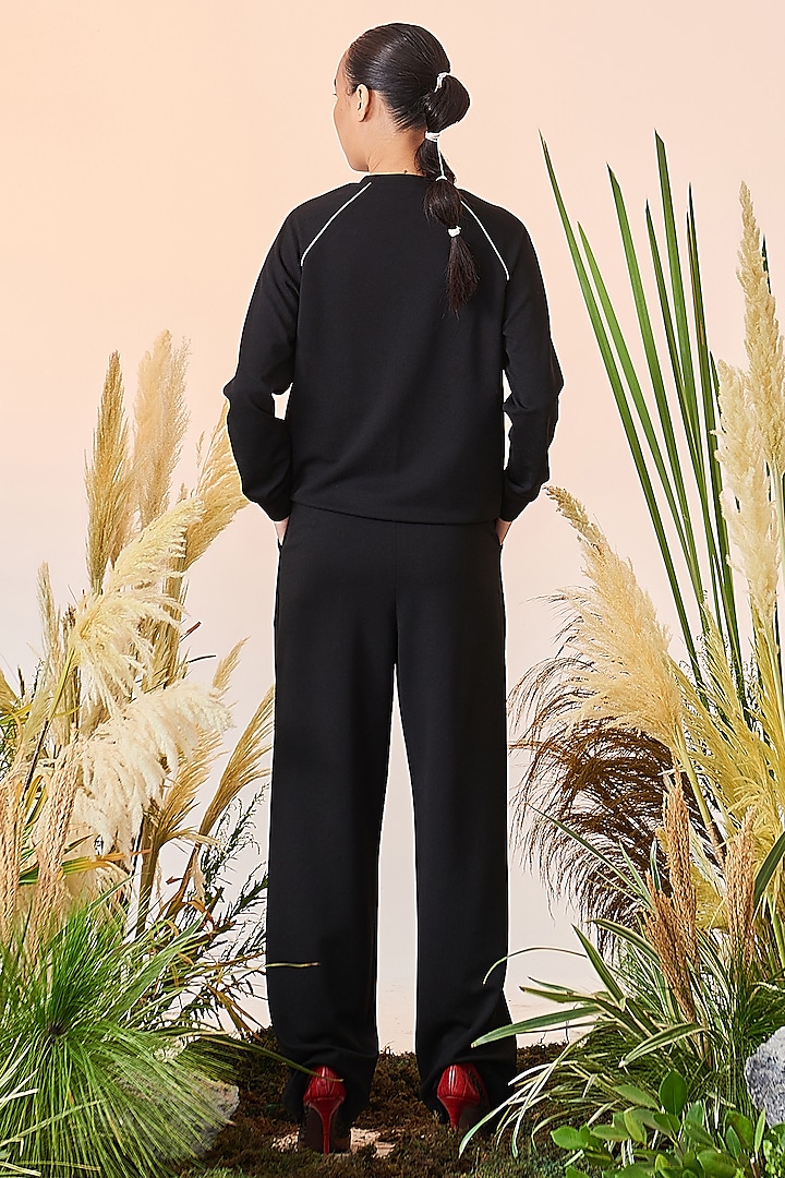 Black Crepe Box Pleated Pants by Shahin Mannan at Pernia's Pop Up Shop