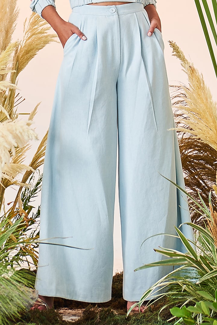 Ice Blue Denim Flared Pants by Shahin Mannan at Pernia's Pop Up Shop