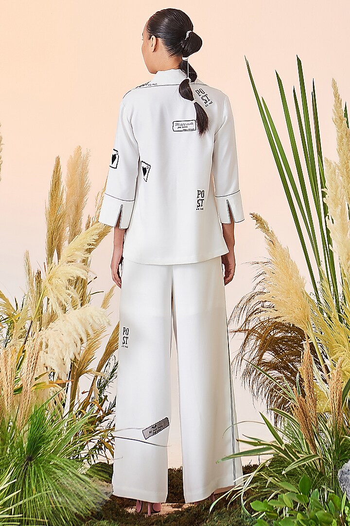 White Satin Embroidered Pants by Shahin Mannan at Pernia's Pop Up Shop