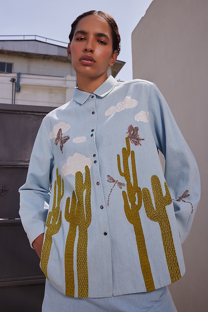 Light Blue Washed Denim Cactus High-Low Shirt by Shahin Mannan at Pernia's Pop Up Shop