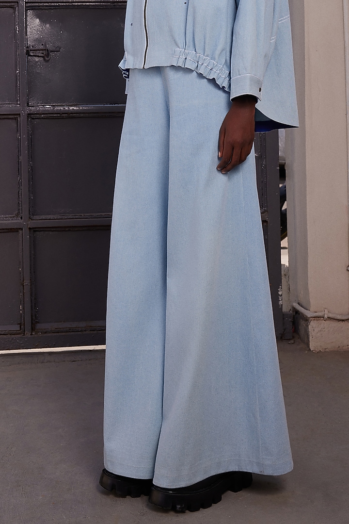 Light Blue Thin Washed Denim Flared Pants by Shahin Mannan at Pernia's Pop Up Shop