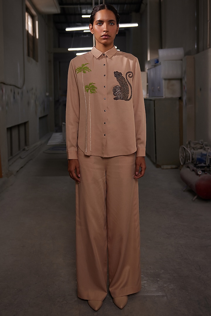 Warm Sand-Colored Tencel Twill Flared Pants by Shahin Mannan at Pernia's Pop Up Shop