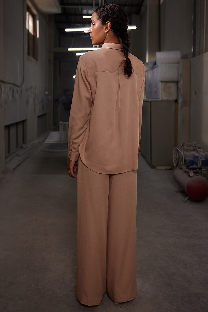 Warm Sand-Colored Tencel Twill Flared Pants by Shahin Mannan at Pernia's Pop Up Shop