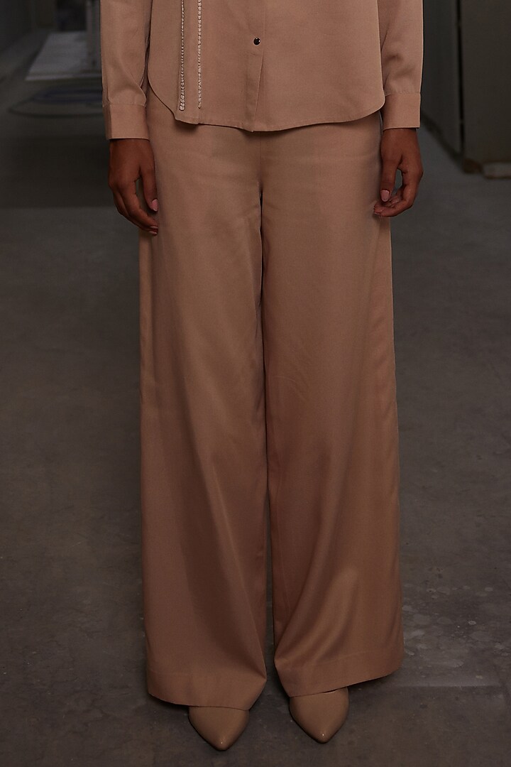 Warm Sand-Colored Tencel Twill Flared Pants by Shahin Mannan at Pernia's Pop Up Shop