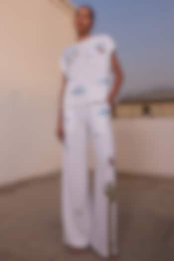 Ivory Japanese Crepe Flared Pants by Shahin Mannan at Pernia's Pop Up Shop