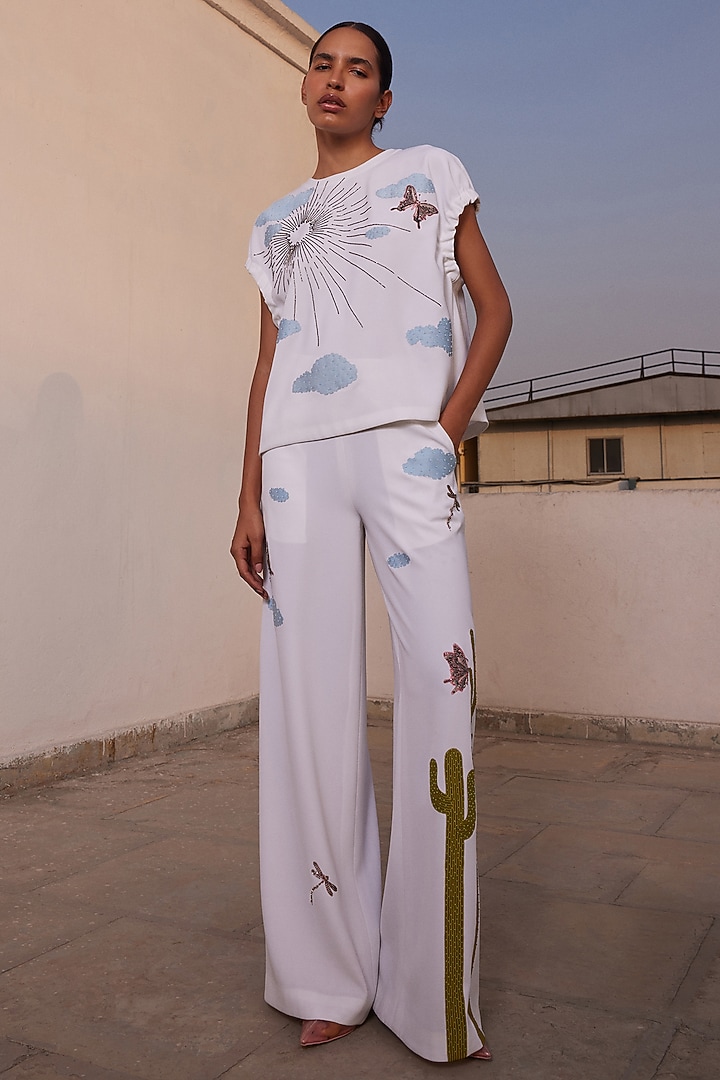 Ivory Japanese Crepe Flared Pants by Shahin Mannan at Pernia's Pop Up Shop