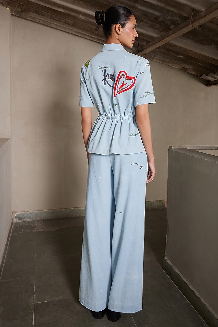 Light Blue Washed Denim Drawstring Top by Shahin Mannan at Pernia's Pop Up Shop