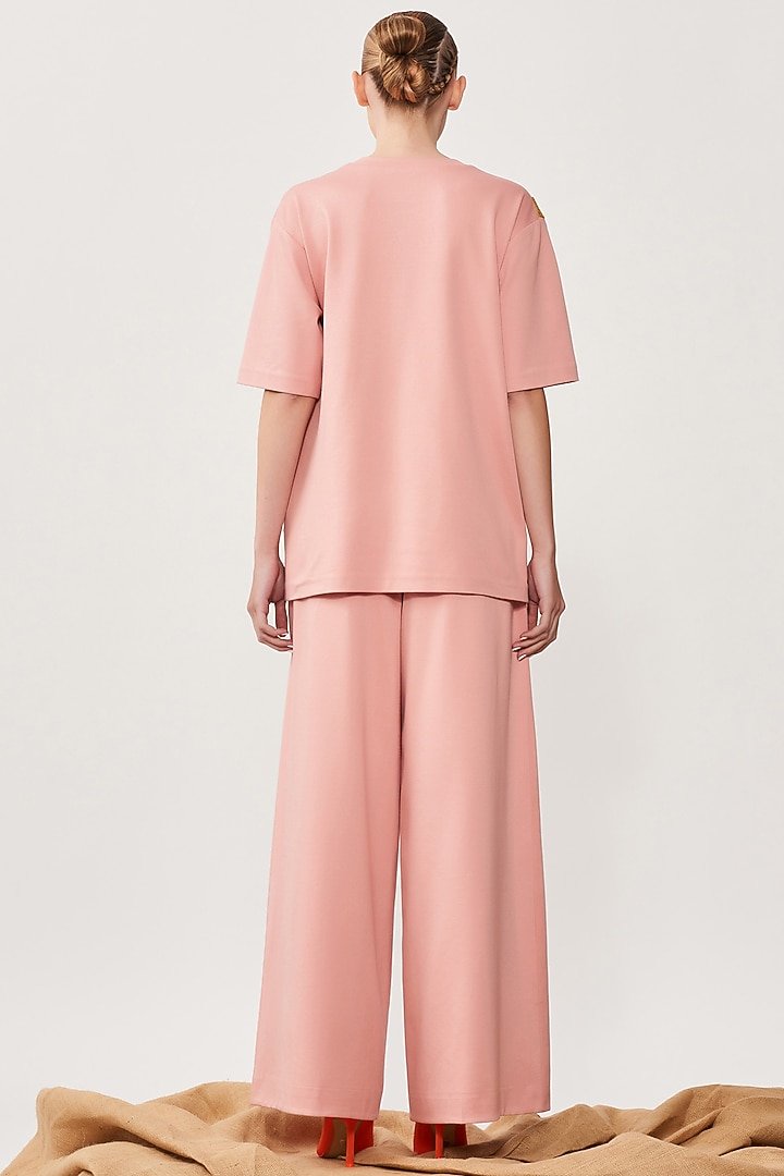 Peach Jersey Flared Pants by Shahin Mannan at Pernia's Pop Up Shop