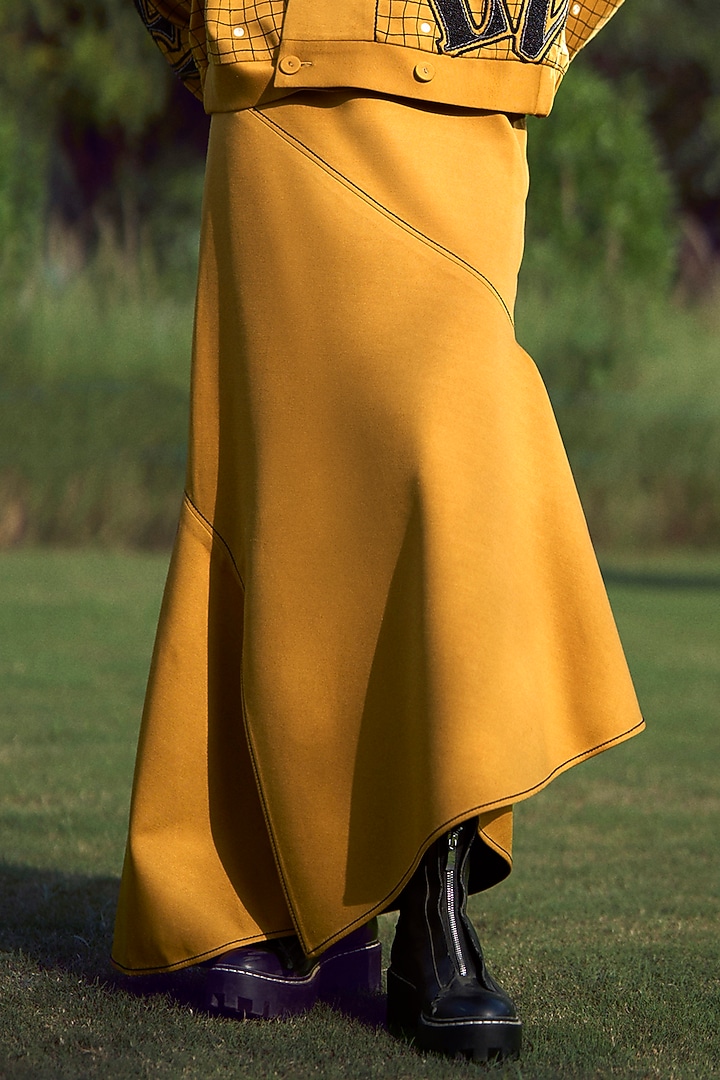 Mustard Jersey Asymmetric Skirt by Shahin Mannan at Pernia's Pop Up Shop