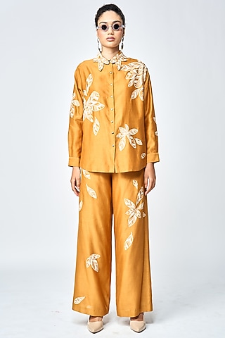 Gold Silk Chanderi Flared Pants by Shahin Mannan