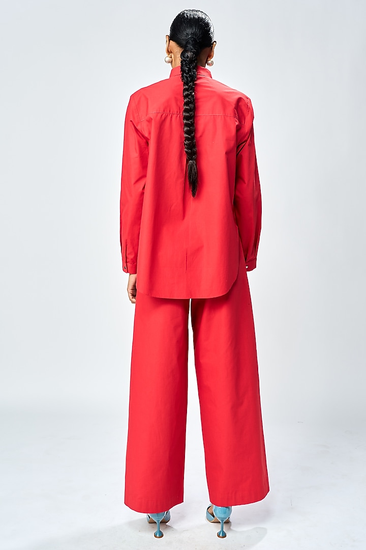 Deep Red Poplin Flared Pants by Shahin Mannan at Pernia's Pop Up Shop