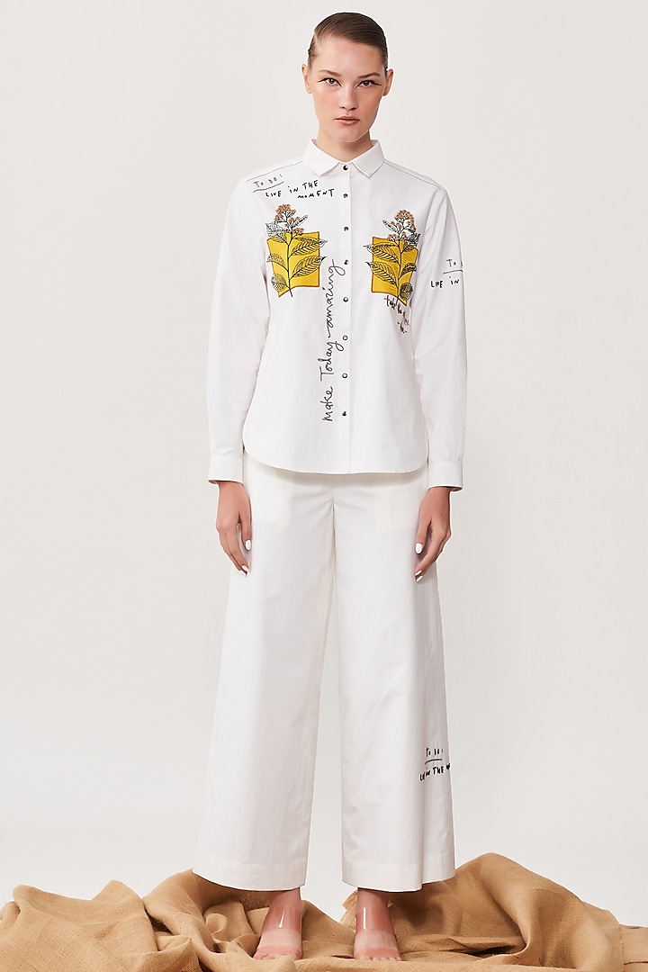 Ivory Embroidered Flared Pants by Shahin Mannan
