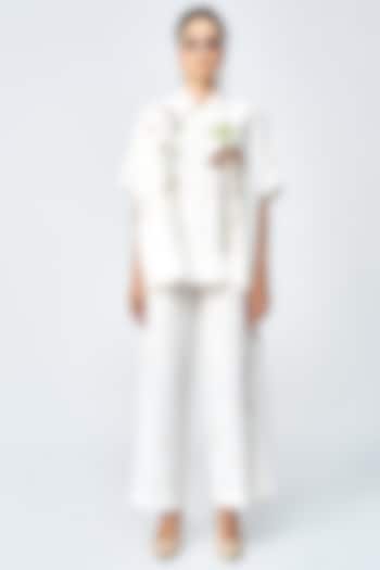 Ivory Cotton Silk Flared Pants by Shahin Mannan at Pernia's Pop Up Shop