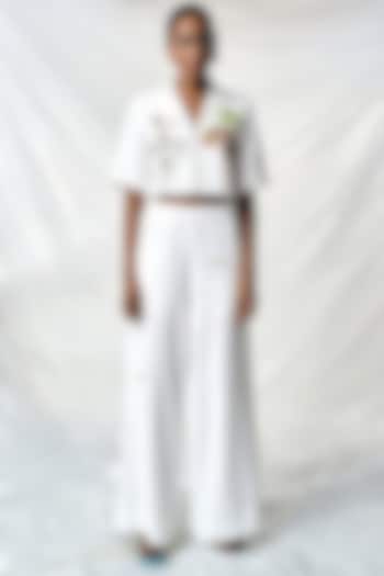 Ivory Japanese Crepe Flared Pants by Shahin Mannan at Pernia's Pop Up Shop