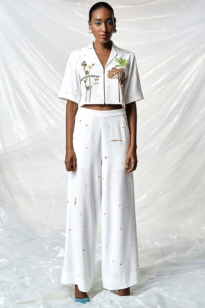 Ivory Japanese Crepe Flared Pants by Shahin Mannan at Pernia's Pop Up Shop