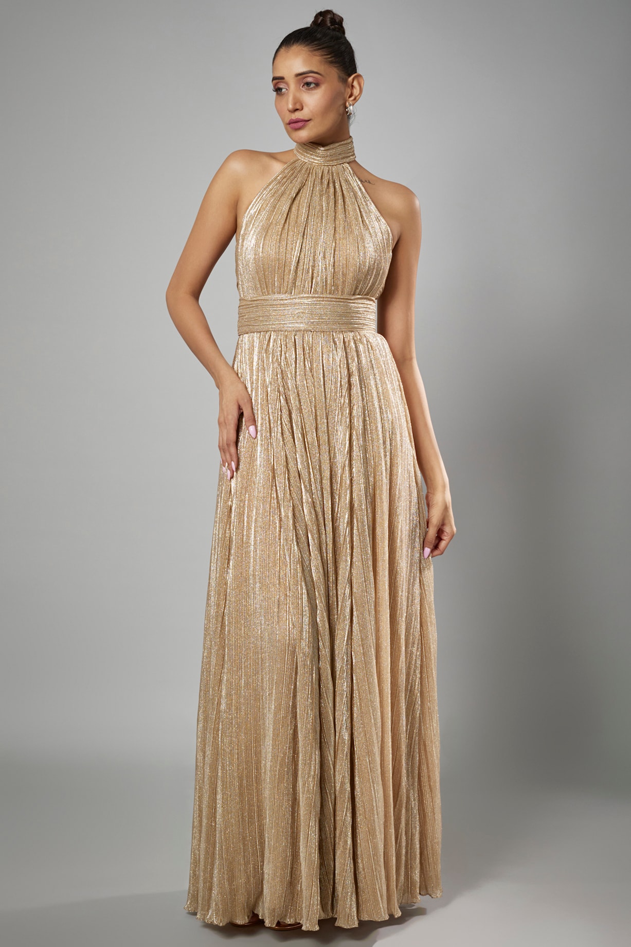 Gold Micro Pleated Lame Shimmer Gown by Sharnita Nandwana at