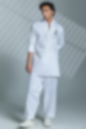 Off-White Cotton Pleated Trousers by S&N by Shantnu Nikhil Men at Pernia's Pop Up Shop