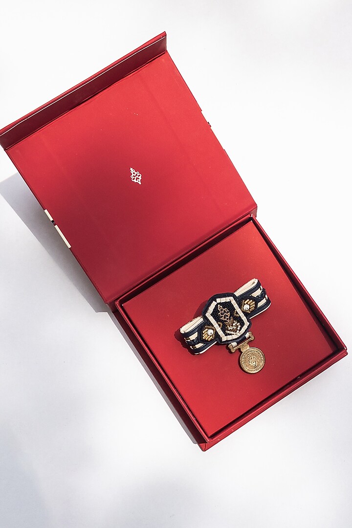 Off-White Faux Leather & Metal Brooch by S&N by Shantnu Nikhil Men at Pernia's Pop Up Shop