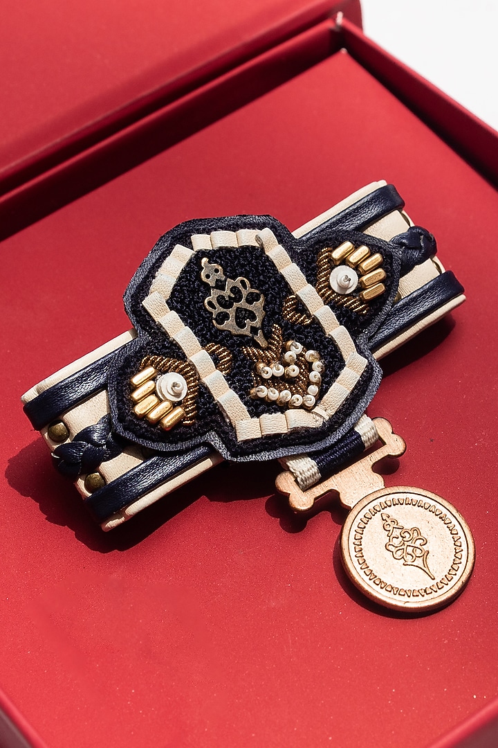 Off-White Faux Leather & Metal Brooch by S&N by Shantnu Nikhil Men at Pernia's Pop Up Shop