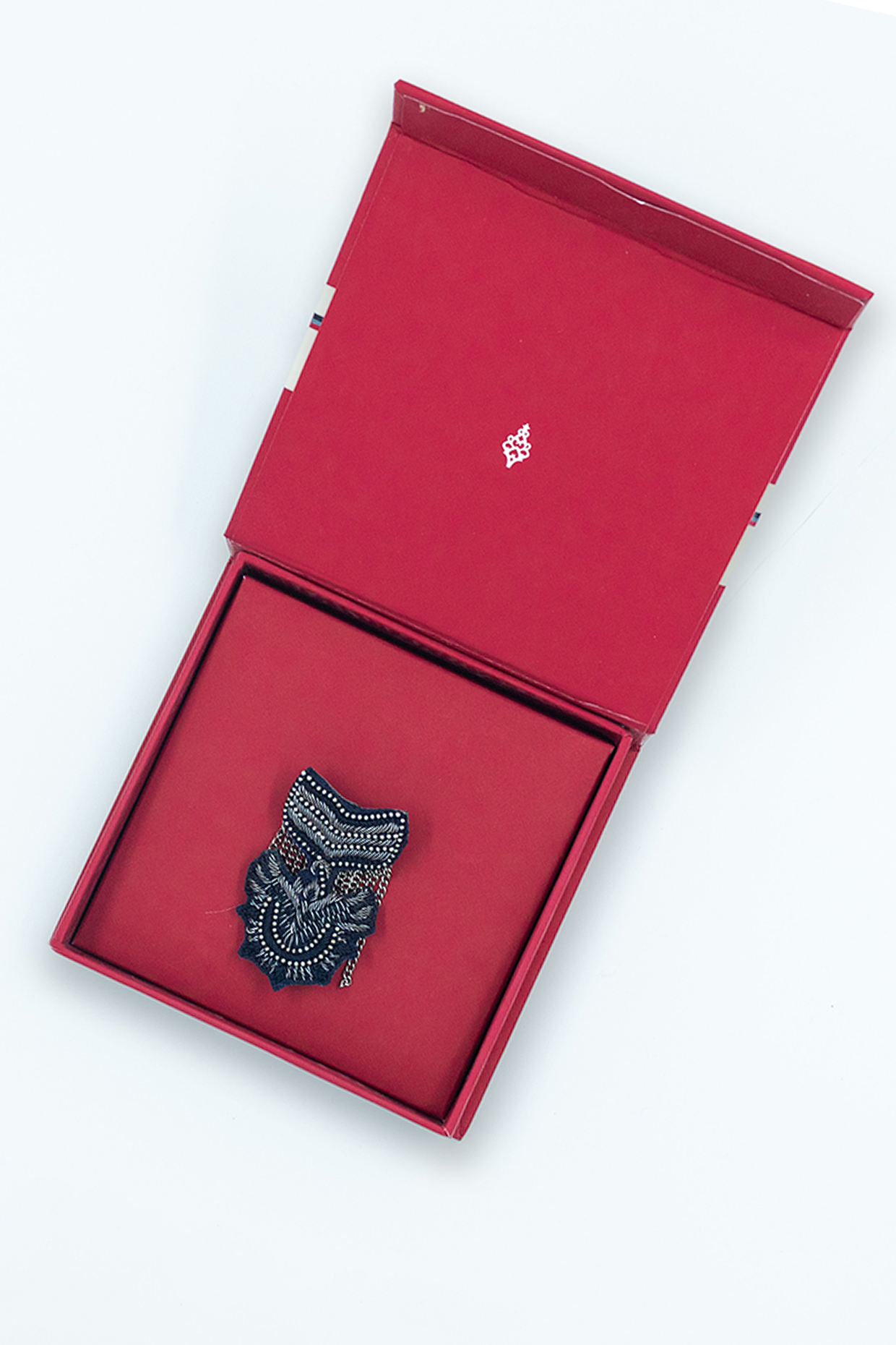 Black Faux Leather & Metal Embellished Brooch by S&N by Shantnu Nikhil Men