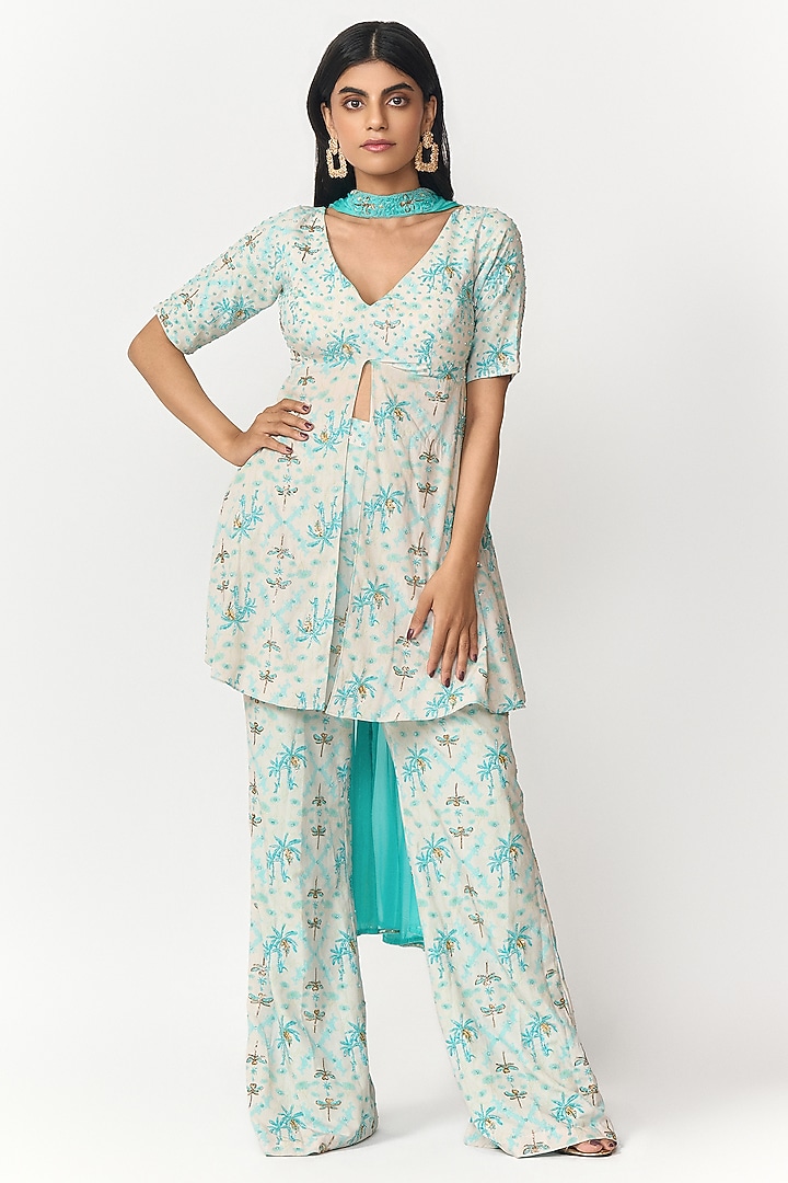 Turquoise Blue & Off-White Crepe Digital Printed Party Wear Sharara Set by Shivani Nirupam at Pernia's Pop Up Shop