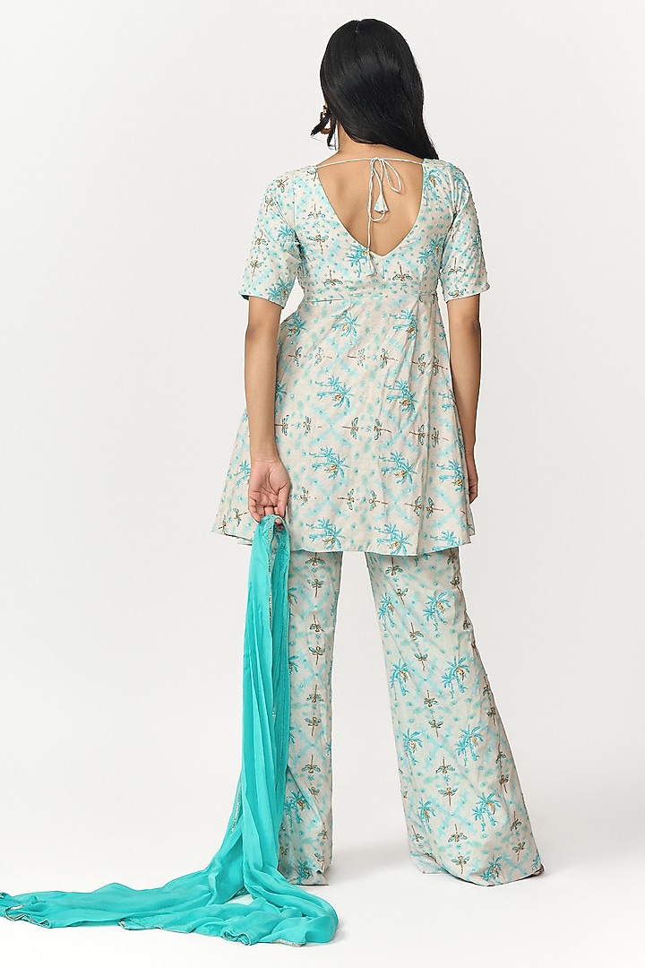 Turquoise Blue & Off-White Crepe Digital Printed Party Wear Sharara Set by Shivani Nirupam at Pernia's Pop Up Shop