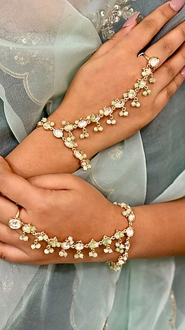 Gold Finish Kundan Polki & Green Beaded Handcrafted Enameled Hathphool (Set Of 2) by Shop Naymee