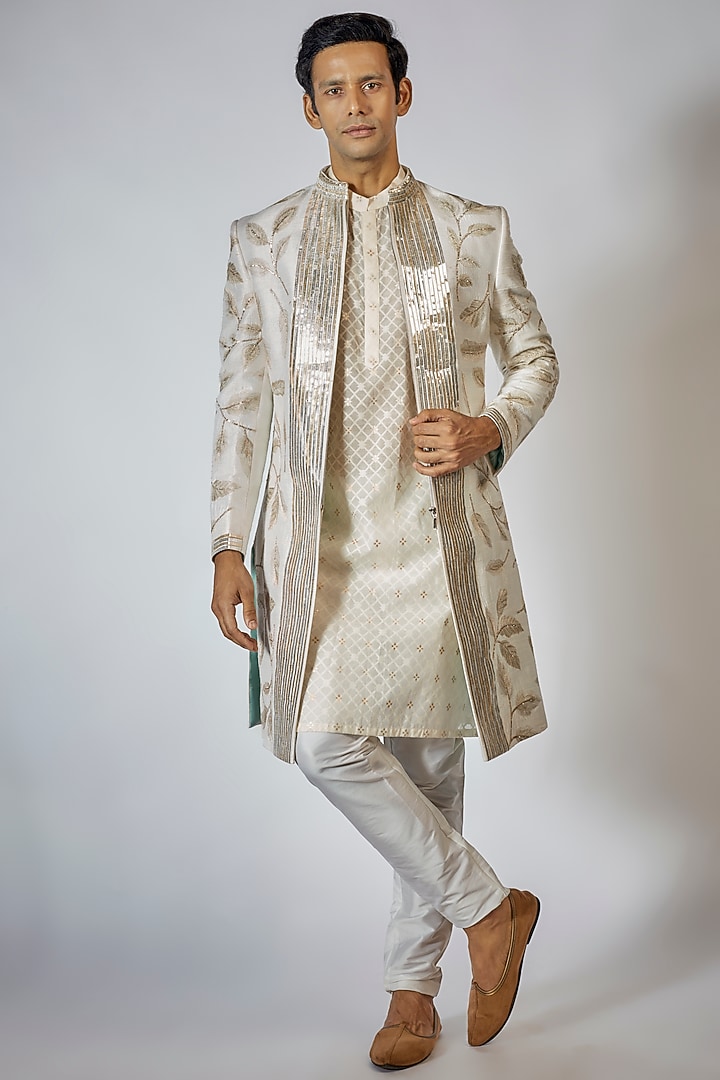 Off-White Raw Silk Zari Embroidered Wedding Indowestern Set by Sharad raghav men at Pernia's Pop Up Shop