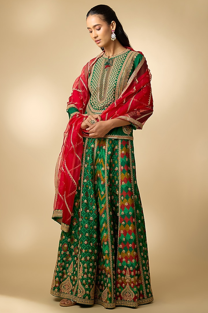 Bottle Green Slub Silk Patola Printed Flared Skirt Set by SHRADDHA RAMBHIA at Pernia's Pop Up Shop