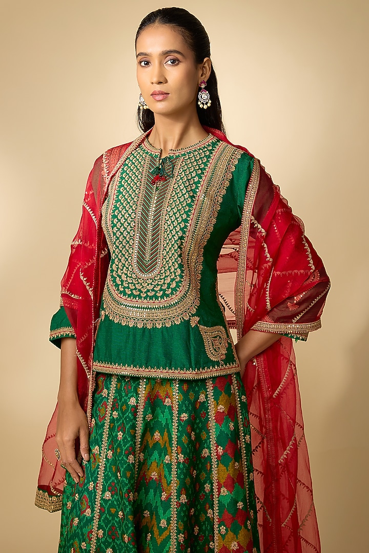 Bottle Green Slub Silk Patola Printed Flared Skirt Set by SHRADDHA RAMBHIA at Pernia's Pop Up Shop