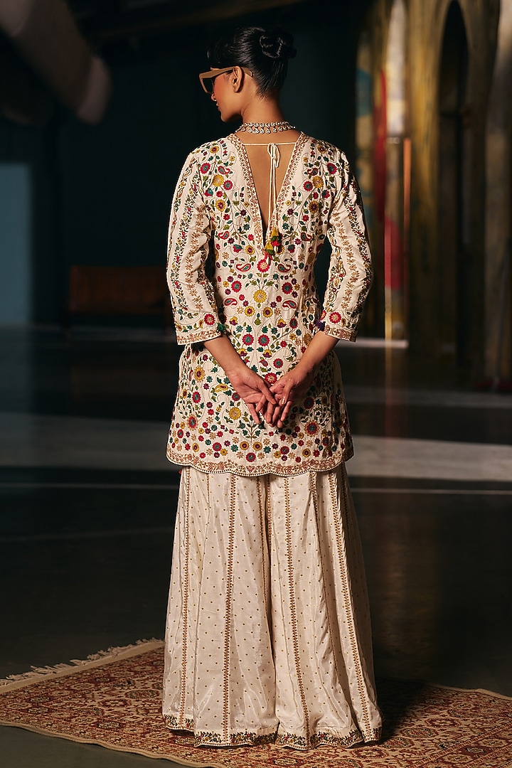 Ivory Vegan Slub Resham Embroidered Short Kurta Set by SHRADDHA RAMBHIA at Pernia's Pop Up Shop
