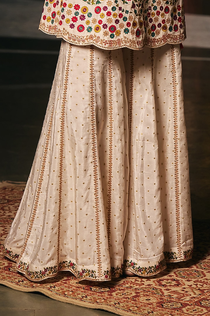 Ivory Vegan Slub Resham Embroidered Short Kurta Set by SHRADDHA RAMBHIA at Pernia's Pop Up Shop