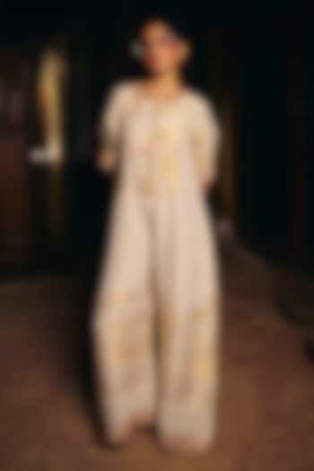 Ivory Fine Chanderi Jacquard Motif Embroidered Jumpsuit by SHRADDHA RAMBHIA at Pernia's Pop Up Shop